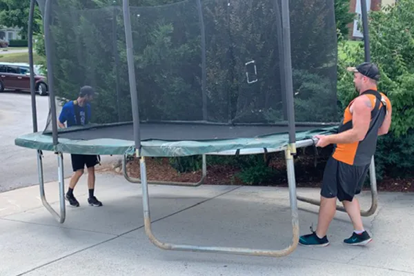 movers with a trampoline
